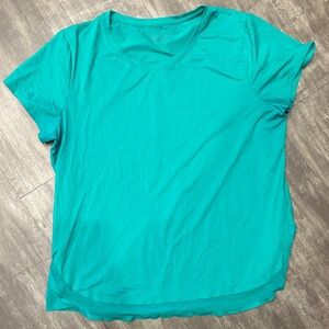 Athleta Kelly green Women's dry fit Top with sheer hem